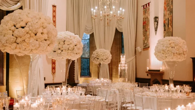 Event Planner: Charlotte Elise. all white wedding reception, white floral tubes, floral arrangement white wedding table.