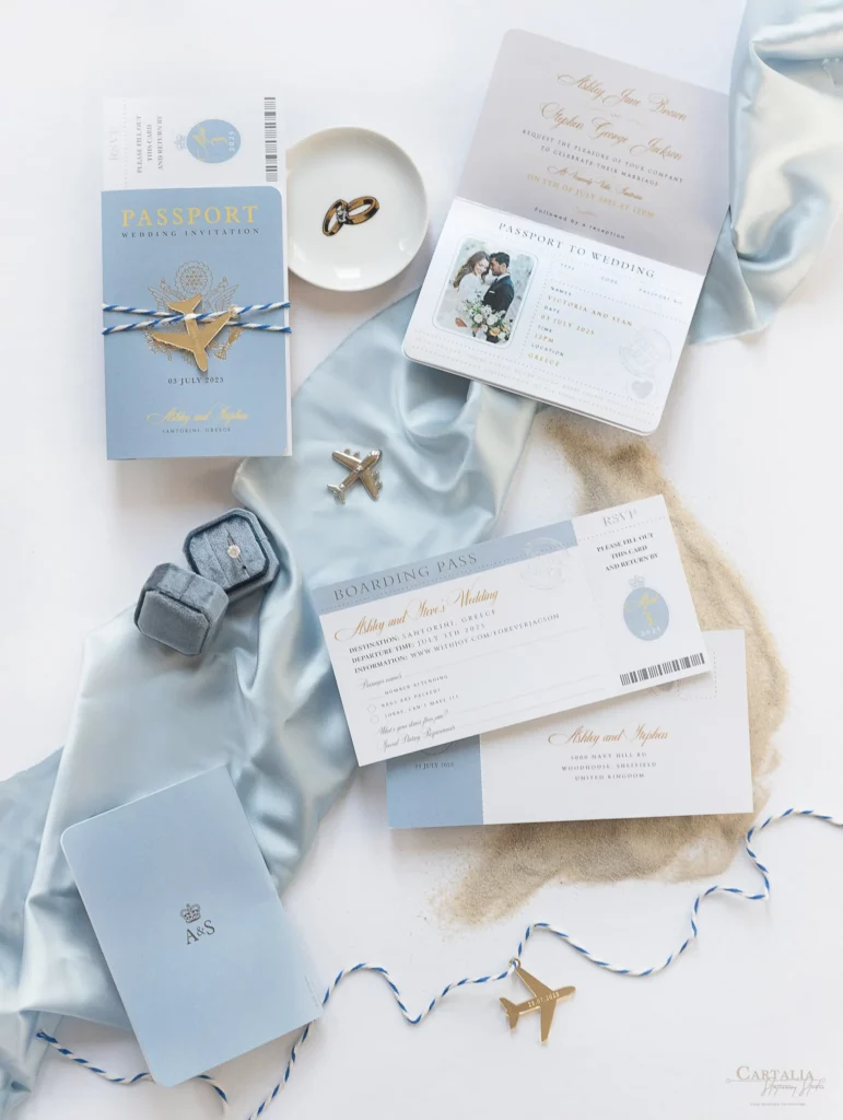 Wedding Stationery: Cartalia. Destination wedding invitations. pastel blue and white airplane wedding stationery.