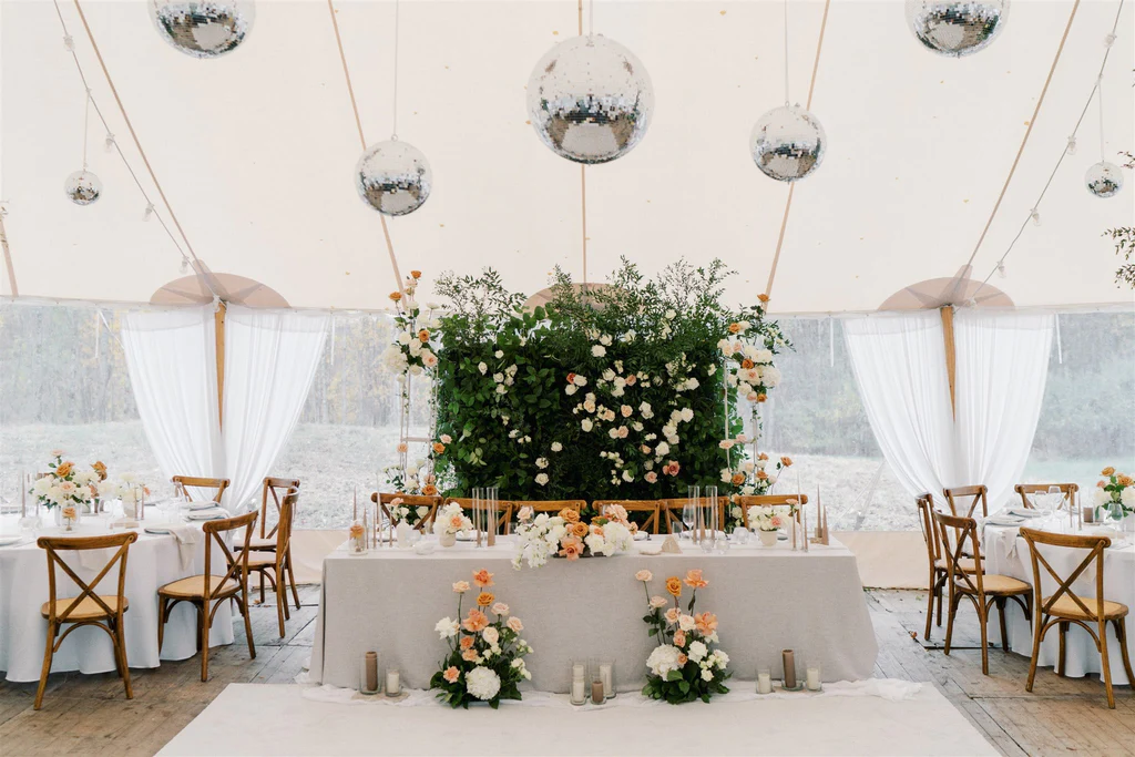 Event Planner: Amanda Costa Thompson. Green wedding backdrop, grey wedding table, wooden rustic wedding reception, disco balls wedding decorations.