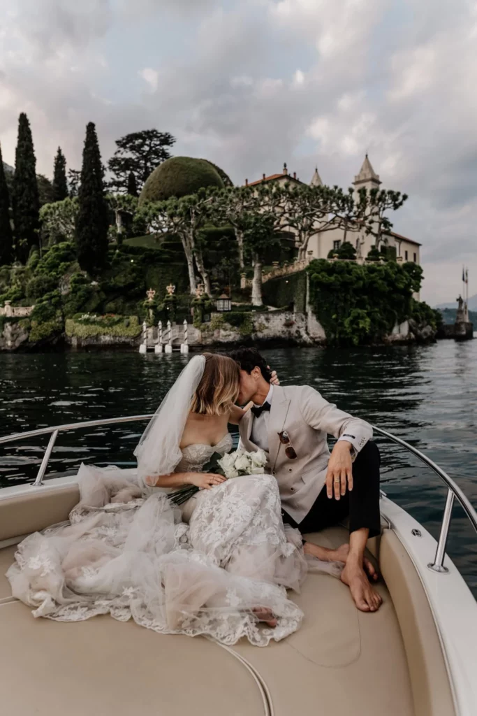 Photographer: Emma Wilder. Destination wedding, bride groom on the boat.