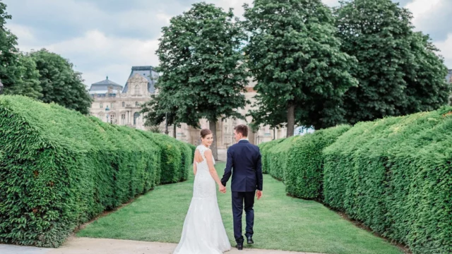 Photographer: Gavin Morgan James. Modern bride and groom in chateau garden.