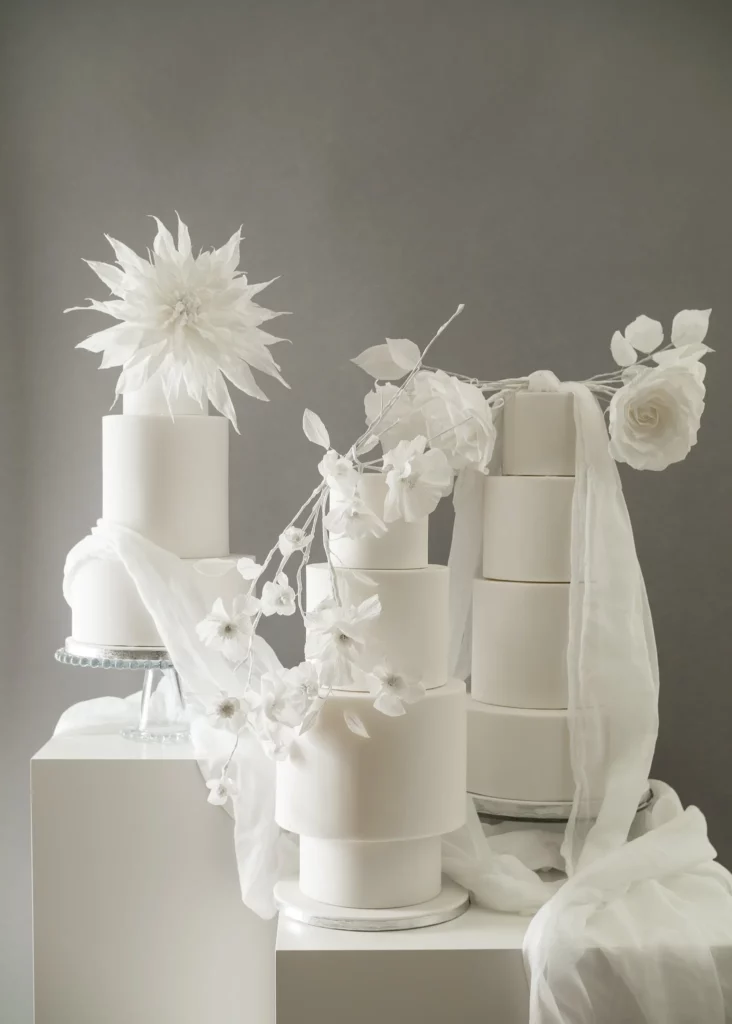 Cake Designer: Rosalind Miller Cakes. white wedding cakes, sugar flowers.