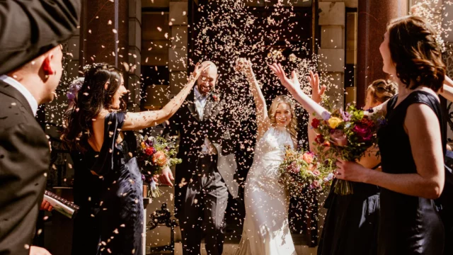 Photographer: Sharron Gibson. Modern wedding, London Town hall wedding ceremony, confetti.