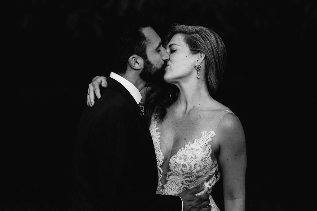 Photographer: Sharron Gibson. Black and white dramatic wedding photograph.