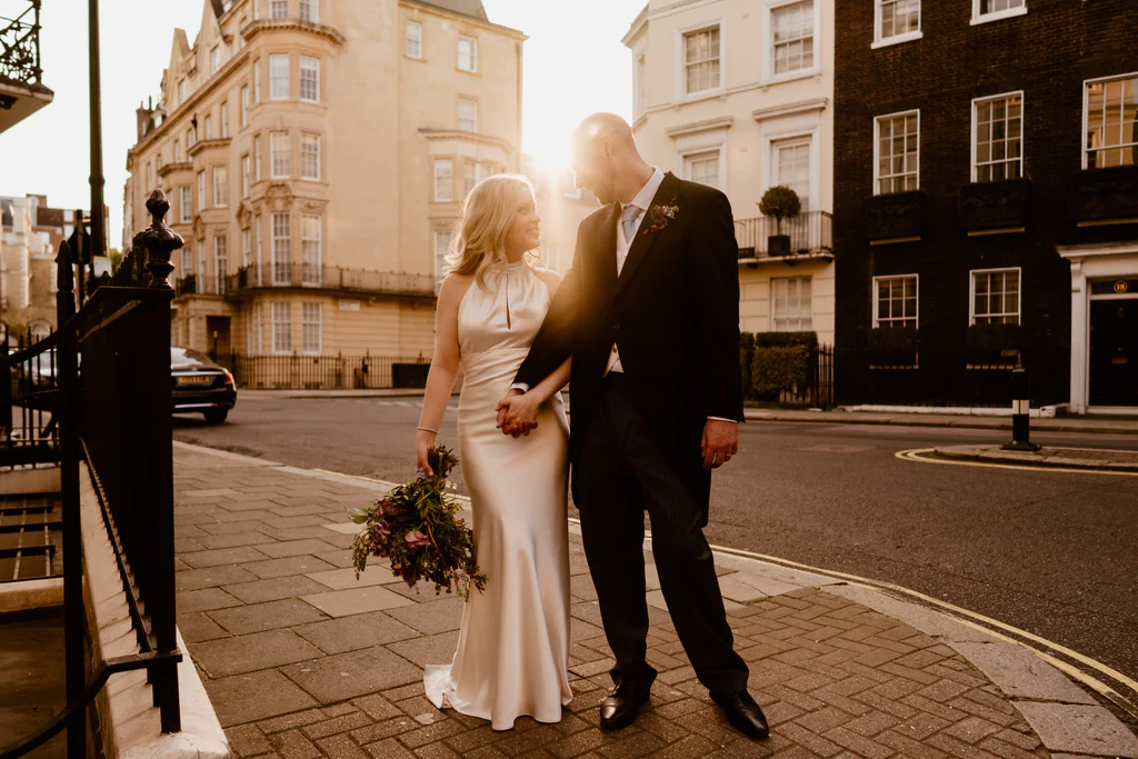 Photographer: Sharron Gibson. Modern London wedding, bride groom.