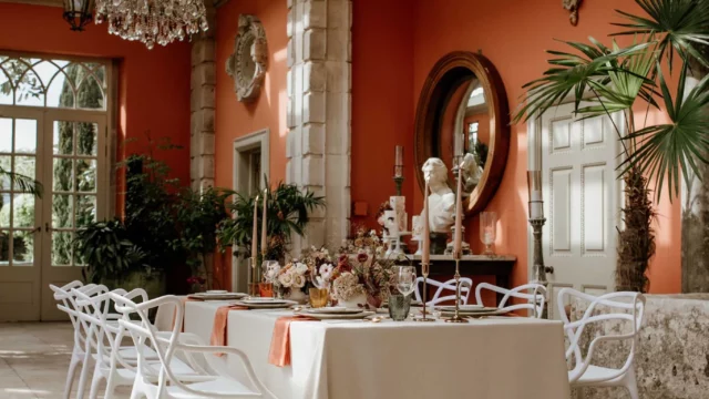 Event Planner: The Stars Inside. Modern wedding elopement table, grey and burnt orange, chandeliers.