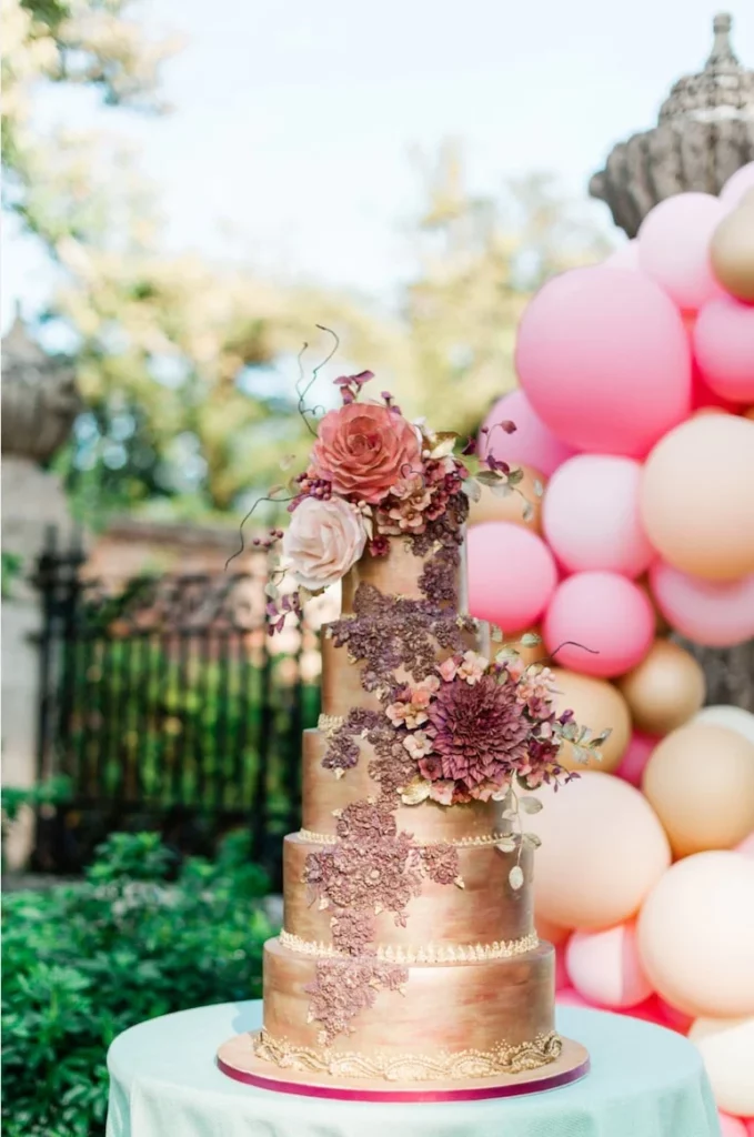 Event Planner: Emma Westacott. Golden wedding cake, birthday cake, pink, rose, gold cake 5 tiers.