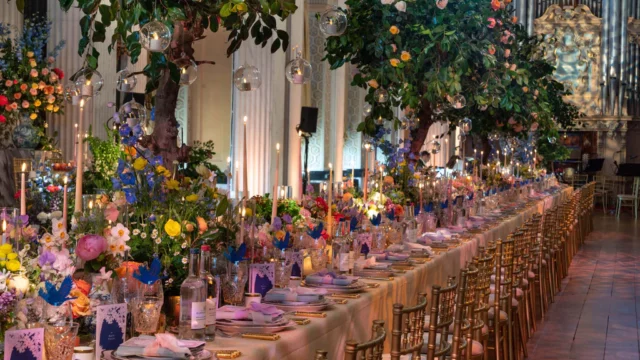 Florist: Wild At Heart. Bright colour vibrant wedding table floral arrangement. rainbow flowers.