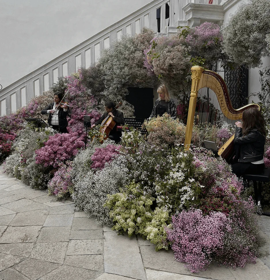 Florist: Wild At Heart. Chanel event floral arrangement.